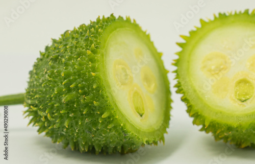 Bilde på lerret Green spiny gourd kakrol vegetable on white background