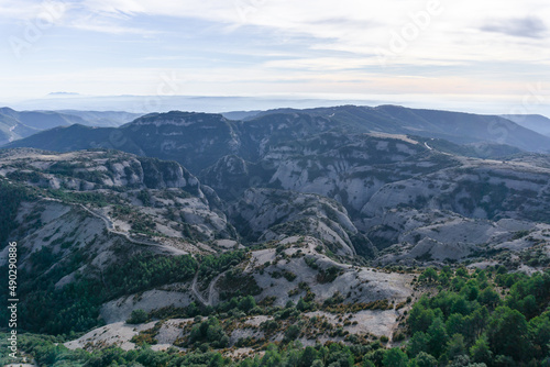Group of stone mountains and green vegetation in Catalonia/ Lleida