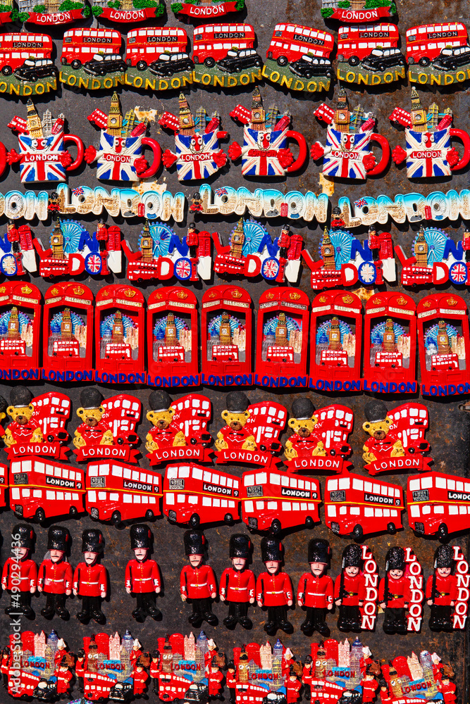 Typical London souvenir fridge magnets including red bus, Beefeater and Union Jack flag.