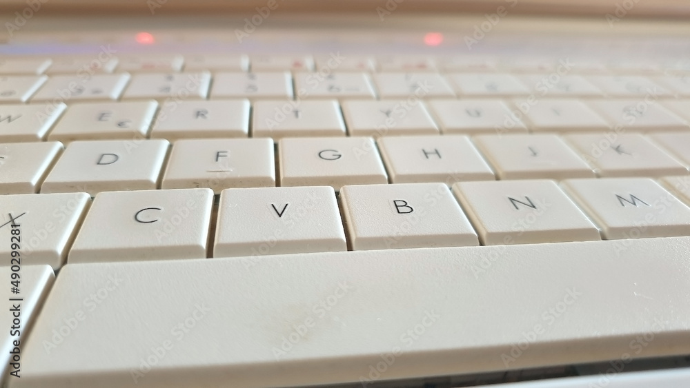 Letters, Connections and symbols of white laptop keyboard internet day concept
Letters, Connections and symbols of white laptop keyboard internet day concept