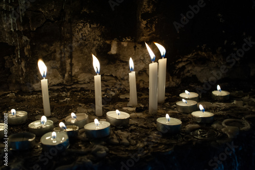 Wax, taper and tea candles burn outside the tomb of King David on Mount Zion in the Old City of Jerusalem. photo