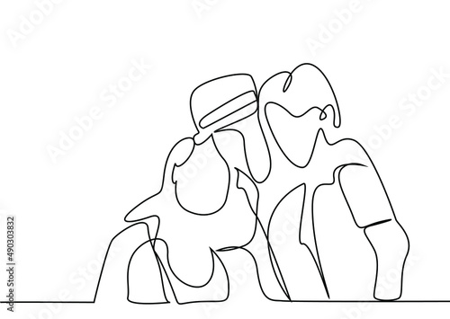 parents and their children hugging each other happily. a soldier returns home from his duty and the family is happy