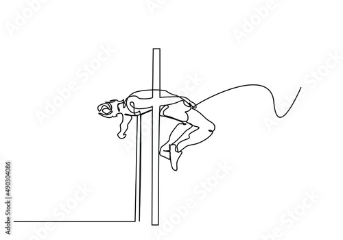 an athlete doing the hurdle high jump crosses the hurdle in the air