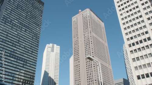新宿の高層ビル群と青空の映像