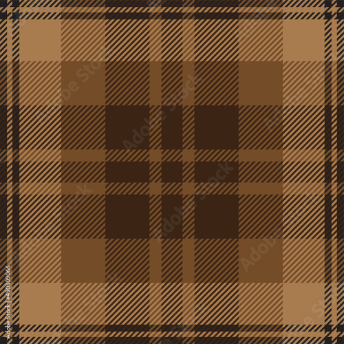 Brown and black tartan plaid. Scottish pattern fabric swatch close-up. 