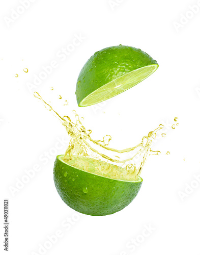Obraz na płótnie Lme essential oil splash isolated on white background.