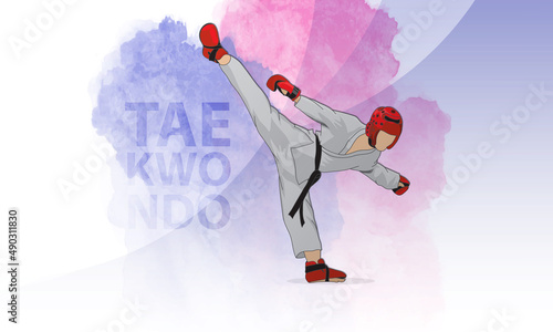 A young taekwondo master makes a kick. The athlete is wearing protective elements of clothing, helmet, gloves, protection on his feet.