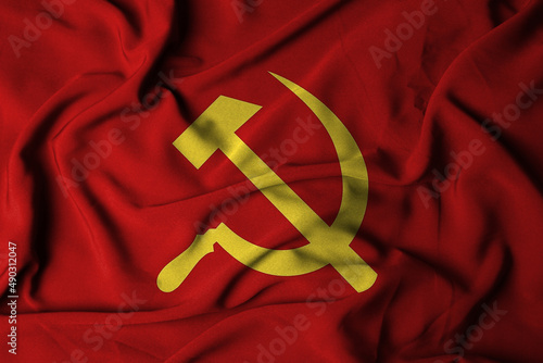Big wavy communist flag on red background textile fabric. illustration of waving the flag. selective focus photo