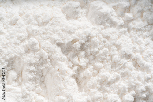 Detailed and large close up shot of powdered sugar.
