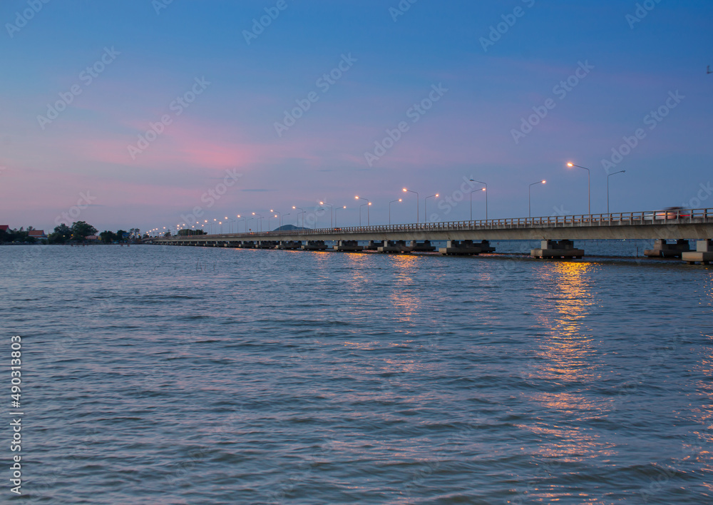 Bridge over a river or sea at dusk or twilight