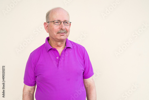 Portrait of senior man looking at camera