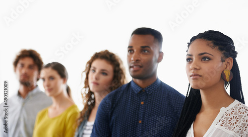 So many possibilities. Cropped shot of a group of young coworkers.