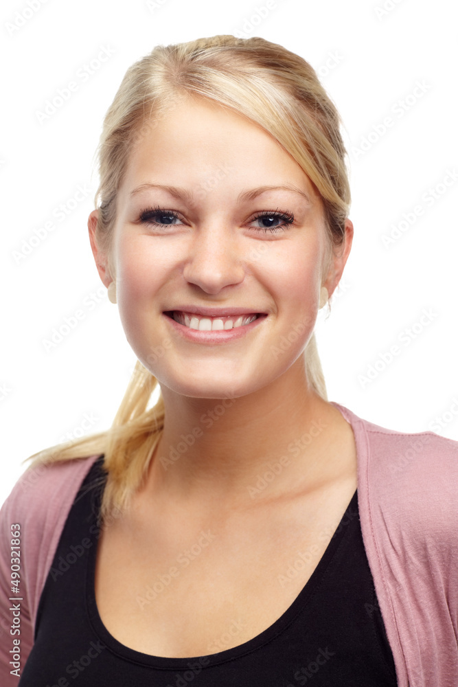 Young and confident. Studio portrait of a beautiful young smiling woman isolated on white. Young and confident. Studio portrait of a beautiful young smiling woman isolated on white.