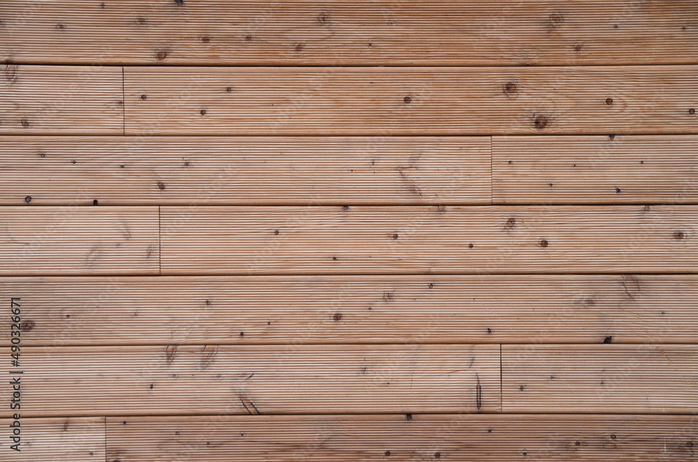 New lacquered wooden wall close New lacquered wooden wall close