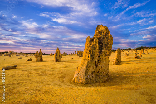 Landscape with jagged limestone pillars in early morning light in the Pinnacles Desert of Western Australia
