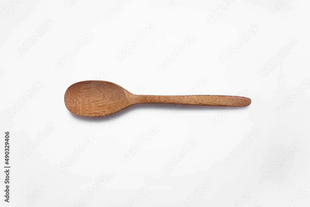 A wooden spoon on white background