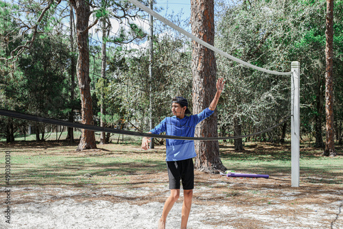 family playing volleyball in moss park in Orlando Florida Lake Nona  photo