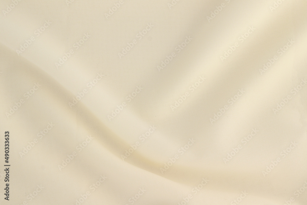Obraz premium Smooth elegant creamy white silk or elegant satin texture can be used as background, elegant wedding background design.
