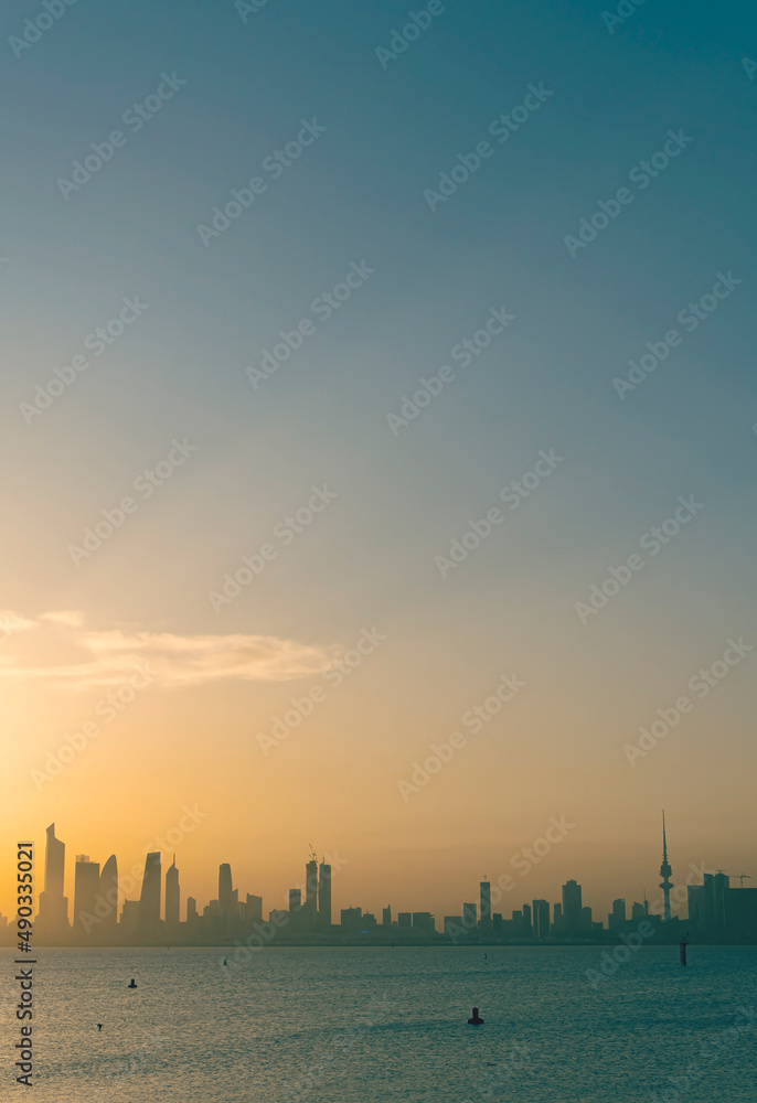 peaceful view of Kuwait cityscape during sunrise