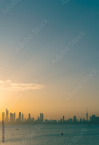 peaceful view of Kuwait cityscape during sunrise