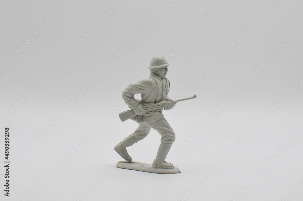 toy soldiers.plastic toys on a white background.Confrontation. toy soldiers.plastic toys on a white background.Confrontation.