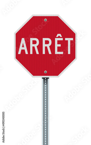 Vector illustration of the red Arret (Stop in French for  Province of Quebec) road sign with reflective effect