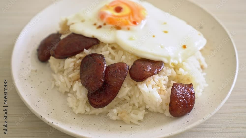 rice with fried egg and Chinese sausage - Homemade food in Asian style