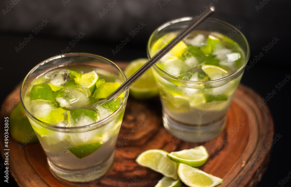 Brazilian Caipirinha. Traditional brazil drink in dark Background Brazilian Caipirinha. Traditional brazil drink in dark Background