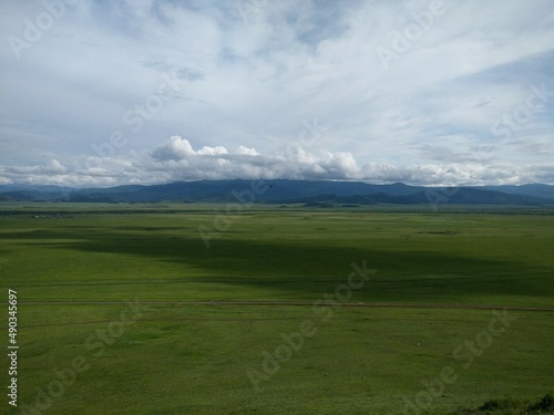 clouds over the mountains in the steppe