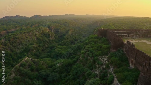 Aerial view of an ancient fort with green mountains