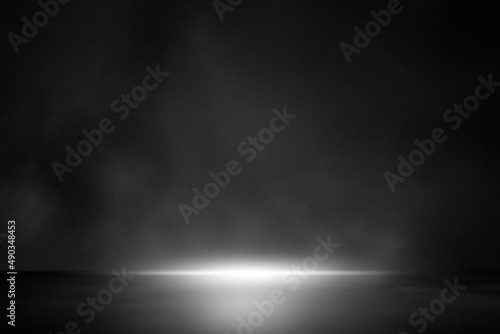 Dark abstract walls are empty and gradient studio rooms with smoke floating within surfaces and bright lights. for displaying products on the background wall