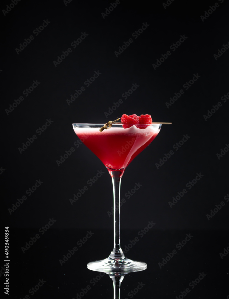 Cocktail in a glass on a black background Cocktail in a glass on a black background