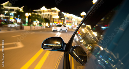 night drive ,shoot from the window of speed car, motion blur steet light. photo