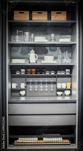 Obraz na plátně storage of dishes and seasonings in a modern kitchen