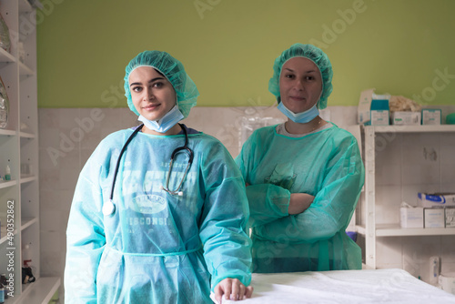 Portrait of doctors wearing uniform and preparing to doing surgical operation at the theater of hospital. Medical Concept.