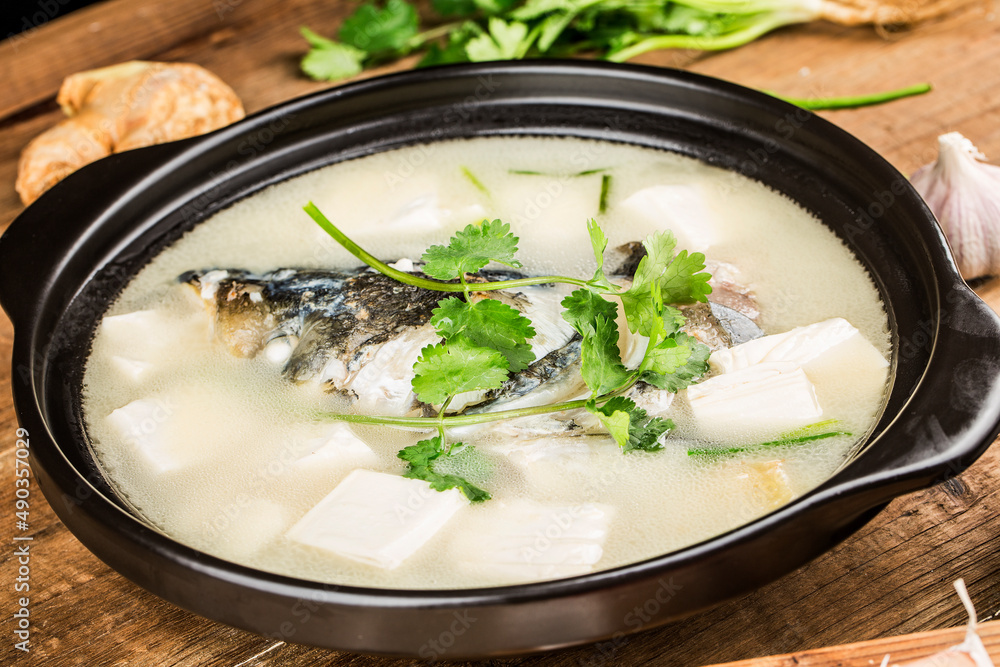 Chinese food-delicious fish head soup .Silver carp head soup Chinese food-delicious fish head soup .Silver carp head soup