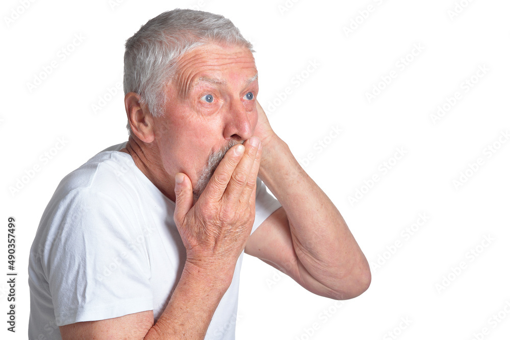 Portrait of emotional senior beautiful man posing on white background Portrait of emotional senior beautiful man posing on white background