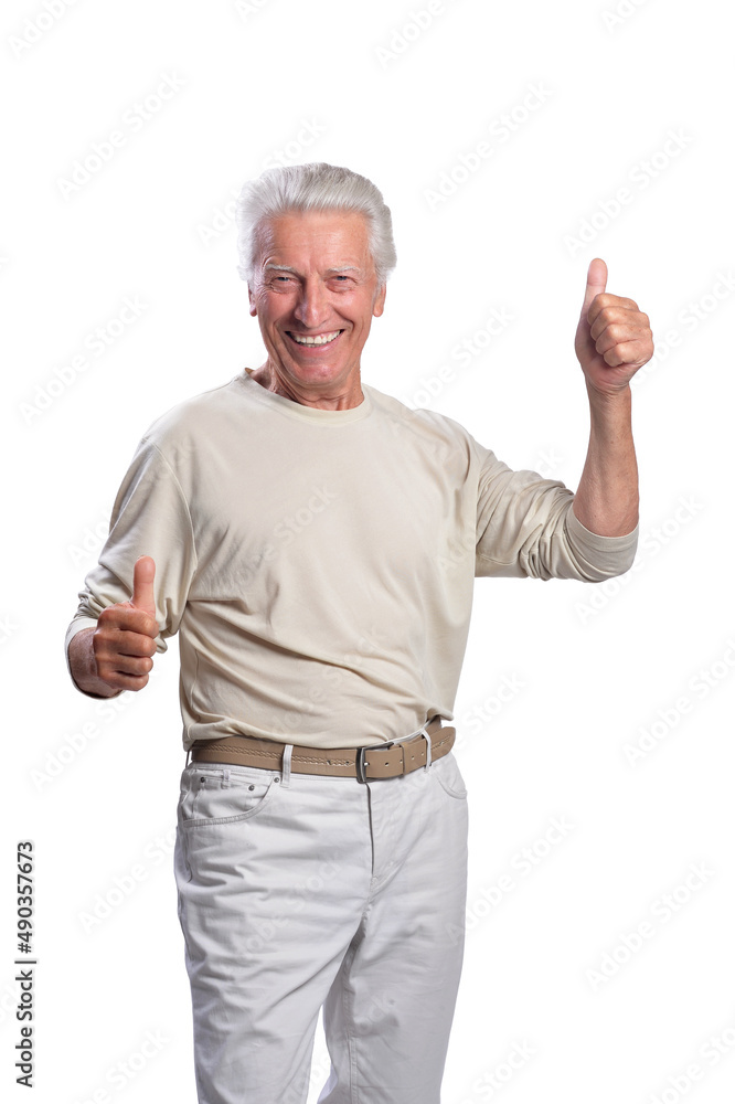 Portrait of senior man with thumbs up on white background Portrait of senior man with thumbs up on white background