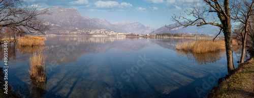 Panoramic view of an alpine lake in winter, Annone, Lombardy, Italy photo