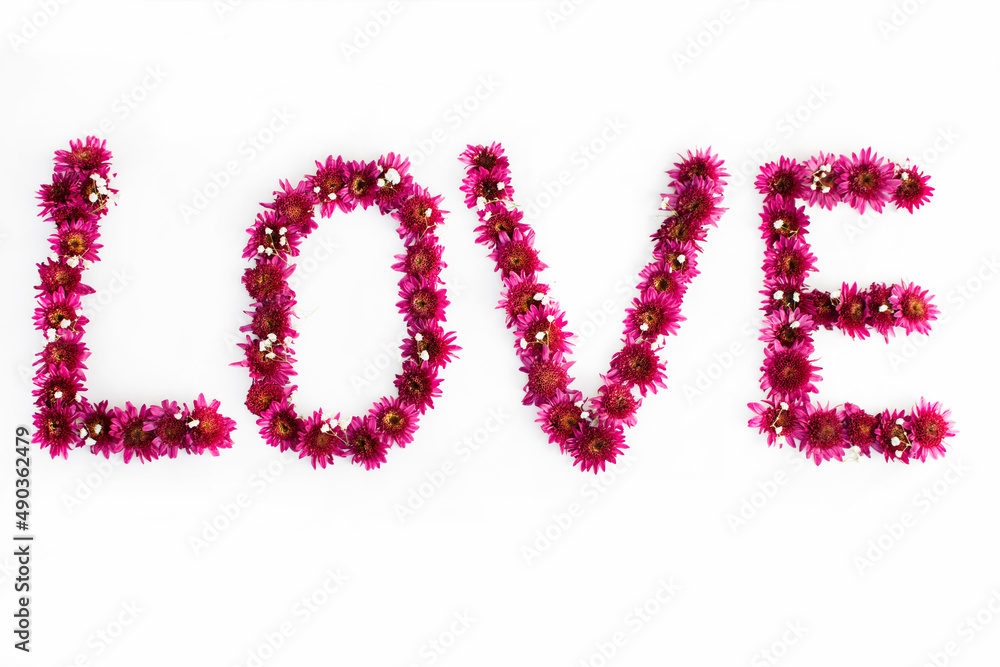 Love sign made from fresh flowers. Love concept