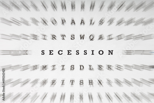 Word Secession in crossword letters with motion focus effect photo