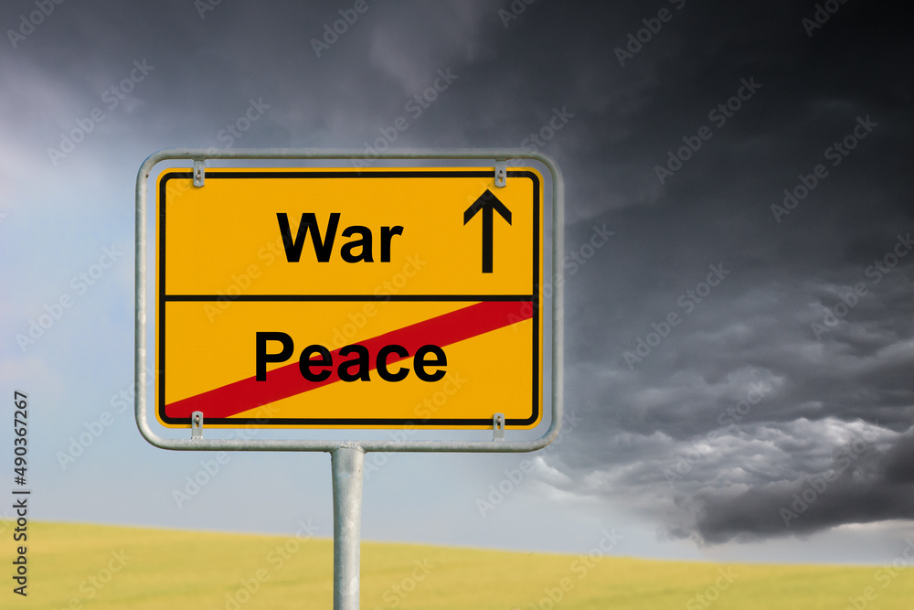 Traffic sign with labels peace and war Traffic sign with labels peace and war