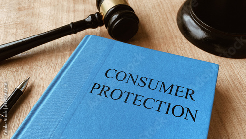 Consumer protection and gavel on a table. Law concept