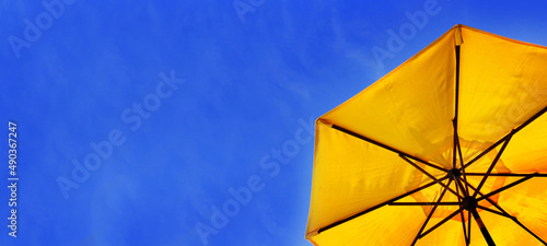 Yellow Umbrella and Blue Sky Panorama Beach or Pool Relax Relaxation