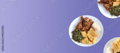 Homemade Creole chicken with breadfruit served in the Caribbean on gradient 2022 trend color background Very Peri photo