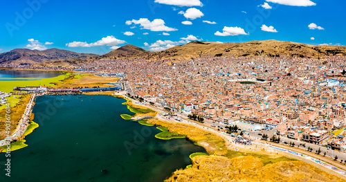 Aerial view of Puno with Lake Titicaca in Peru, South America photo