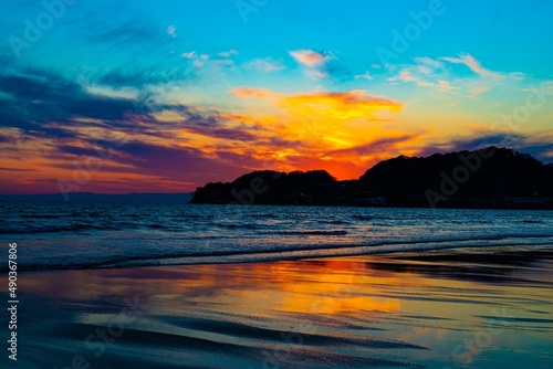 Beautiful sunset seen from the beach © 周平 大竹