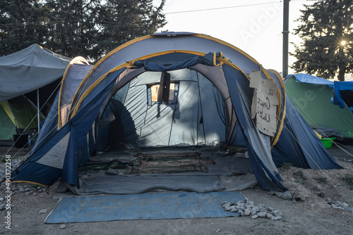 Improvised masjid, improvised mosque in a tent for praying. Difficult life conditions in transit refugee/migrant camp at the Greek-North Macedonian border, Idomeni.  photo