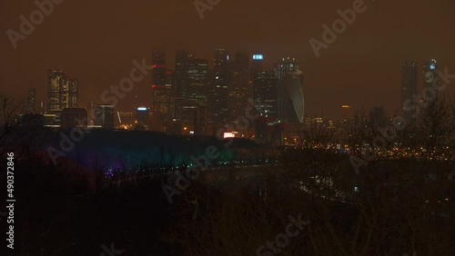 MOSCOW, RUSSIA - JANUARY 08 2022: Panorama view of the Moscow city complex. A developing business district in Moscow on Presnenskaya embankment photo