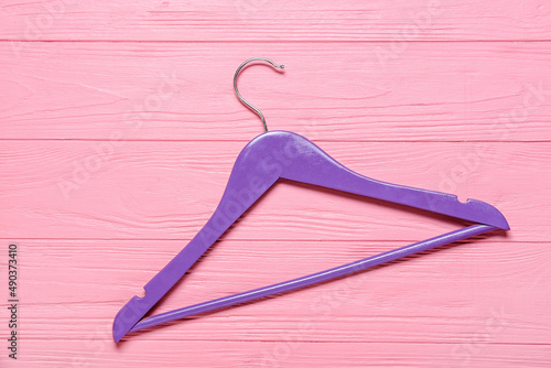 Clothes hanger on color woo...